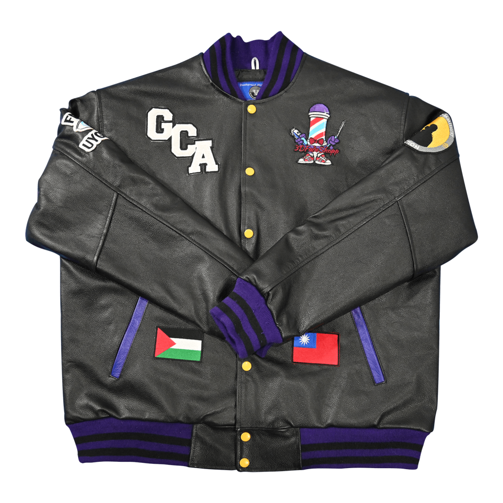 Black leather custom letterman jacket featuring GCA chest lettering, barber pole graphic patch, national flag patches, and purple striped ribbed trim from our varsity jackets online collection.